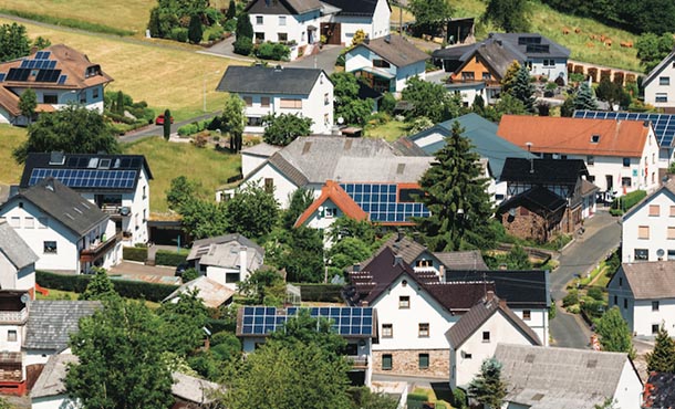 aerial view of houses with roof-top solar panels