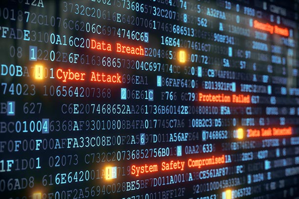 A stock image of digital data with the words cyber attack and data breach spelled out.