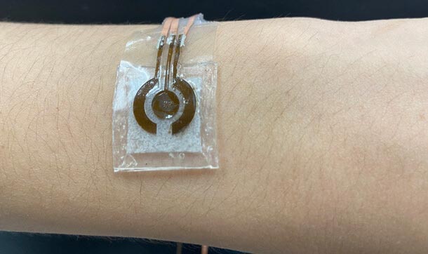 A device consisting of an electronic sensor attached to a small alkaline solution chamber is worn on a human arm