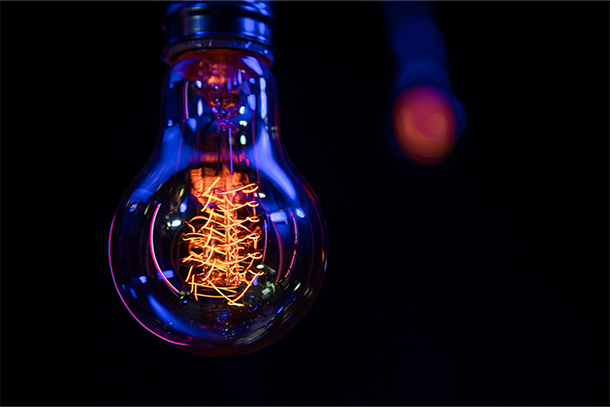 A lightbulb on a black background.