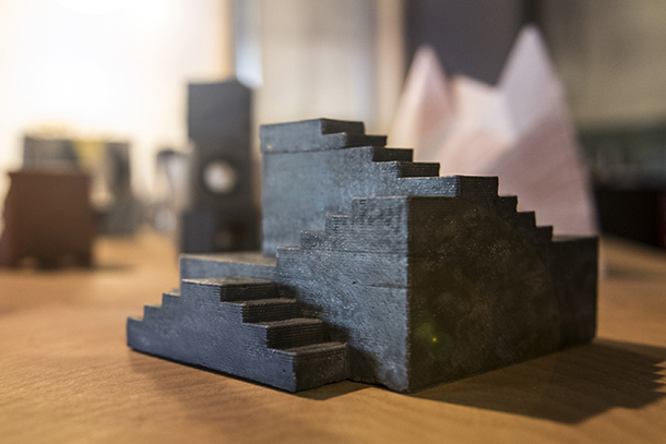 A close-up of dark gray miniature stairs.