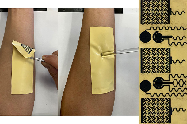 image of sensitive smart skin being applied to individuals forearm, with a larger image of the smart skin device to the far right of the image.