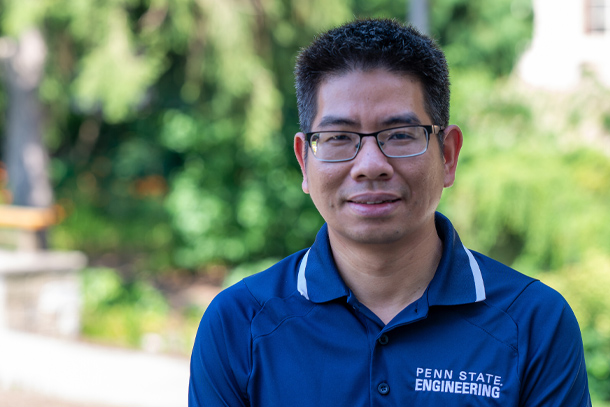 A portrait of a person in glasses and a blue polo that says "Penn State Engineering"