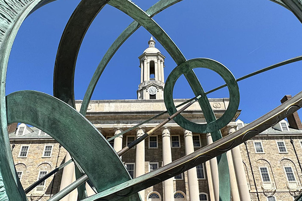 Old Main viewed through Armillary Sphere