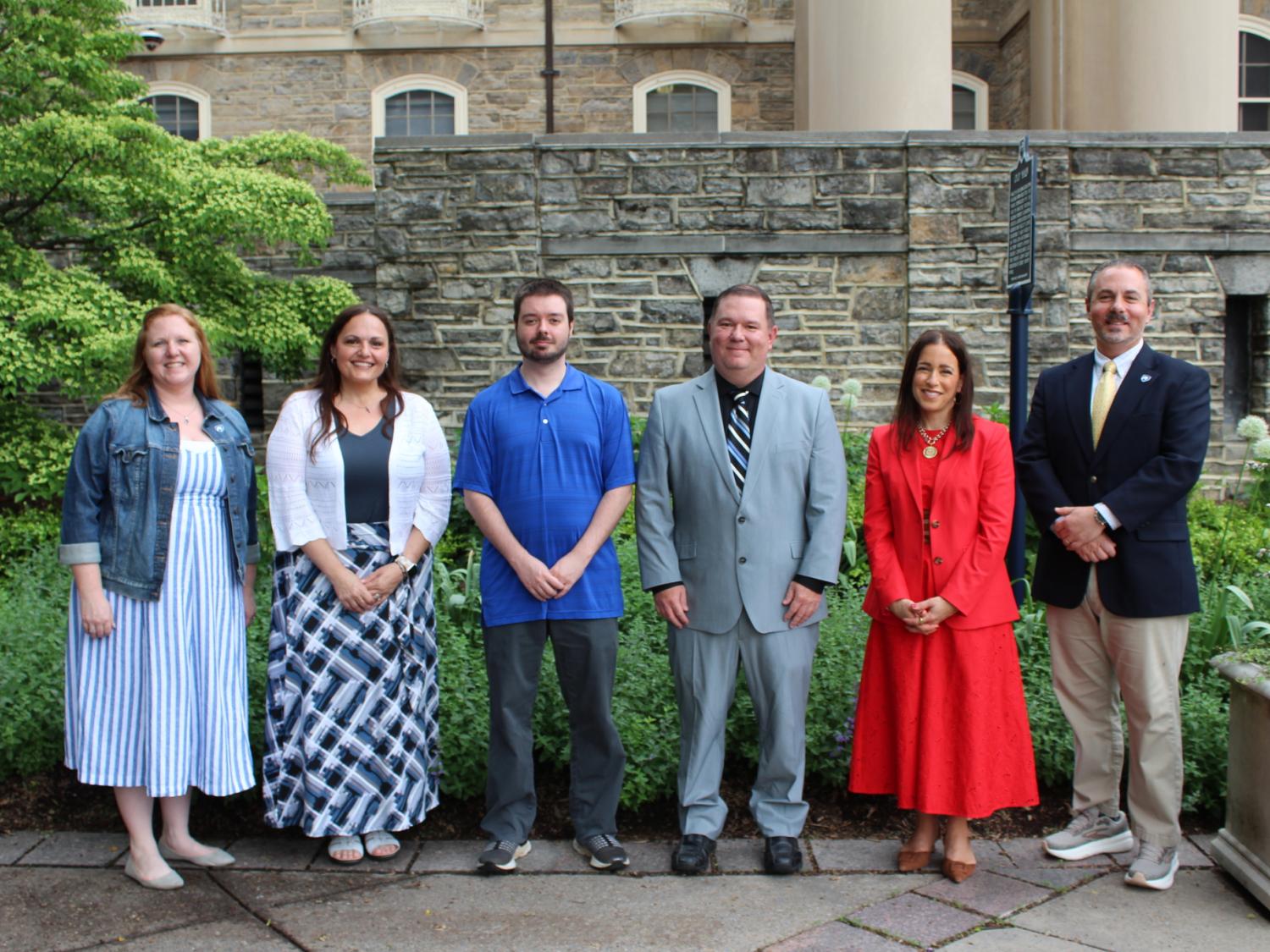 Various University Staff Advisory Council (USAC) members stand together in a photo.