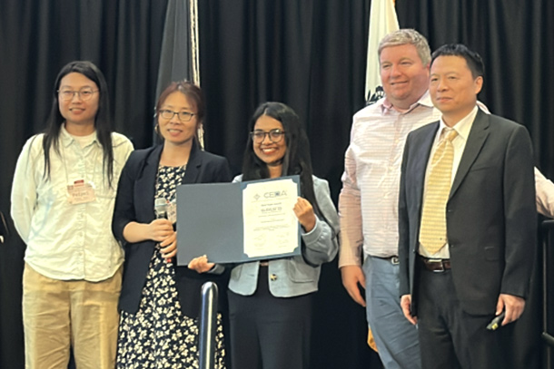 A group of people stands to accept the Best Paper Award at the 2025 ACM Great Lakes Symposium on VLSI